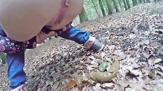 Cute girl poops in the forest
