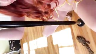 Redhead girl poops while pole dancing