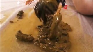 Japanese scat gal pooping on a doll