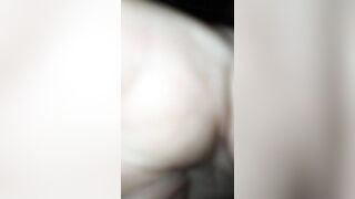 Woman takes a shit on a white blanket