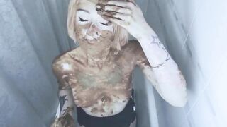 Kinky blonde smearing shit on her lovely face