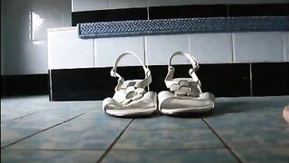 Girl pisses and poops in white sandals