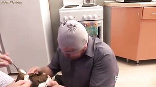 Two girls feed shit to a slave