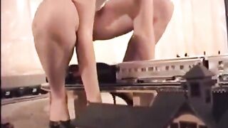 Woman Shits On A Toy Model Train
