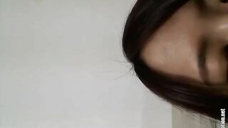 Young Asian girl smokes and poops while fingering