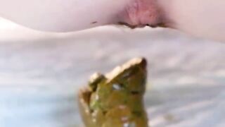 Young beautiful Jap lady pooping