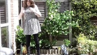 Woman poses in her garden after a huge shit