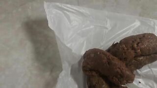 Girl takes a huge shit on a paper towel