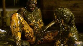 Girls roll around in a pile of shit and piss