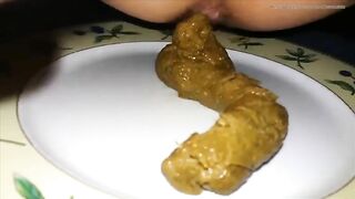 Woman eats shit from a plate