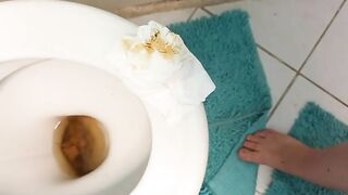 Woman takes a shit on the toilet and leaves it there