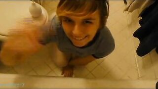 Woman lays in a shit-filled balloon in the bathtub