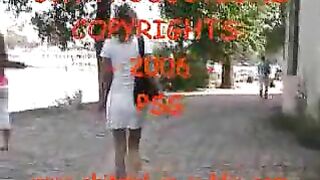 Girl in white shirt takes a shit on the wall