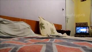 Girl lays on her side and takes a load of shit on the bed