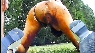 Girl covered in shit gets her ass fucked outdoors