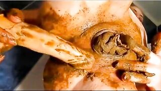 Woman pulls her asshole open while playing with a big shit