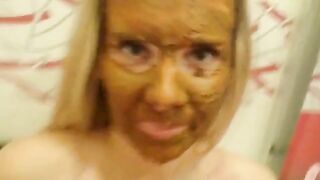 Woman covers herself in shit in the bathroom