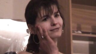 Woman bends over and spreads her ass for the camera