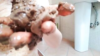 Woman eats a big pile of shit in the bathroom