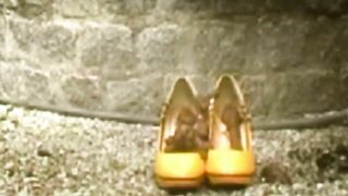 Girl drops a huge shit in the grass while wearing high heels