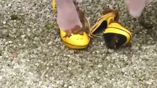 Girl drops a huge shit in the grass while wearing high heels
