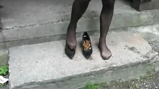 Slut squats in heels and shits on outdoor steps