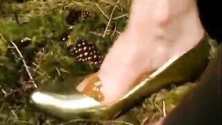 Woman takes a big shit in her high heels on the grass