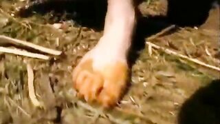 Woman takes a big shit in her high heels on the grass