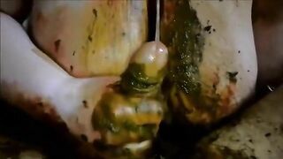 Woman scoops up shit with her hand from the floor