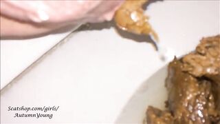Slut plays with raw shit and piss with a knife