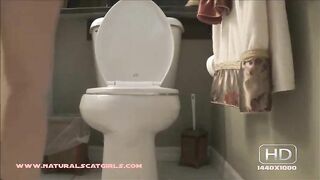 Bare assed woman takes a huge shit on the bathroom floor
