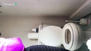 Woman takes a huge shit on a toilet