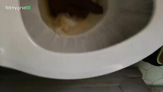 Woman takes a huge shit on a toilet