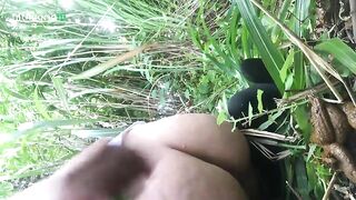 Girl on her hands and knees takes a huge shit in the grass