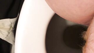 Woman spreads her ass and shits in a toilet