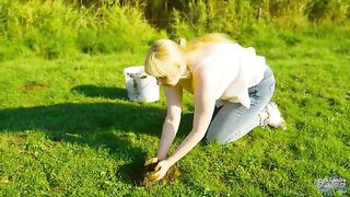 Playing with cow shit in the cow pasture