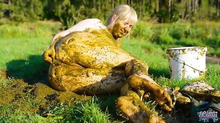 Playing with cow shit in the cow pasture