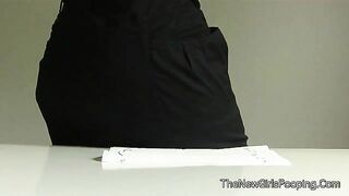 Woman drops a massive shit on a paper
