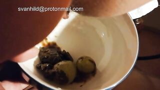 Girl holds a bowl of shit and balls