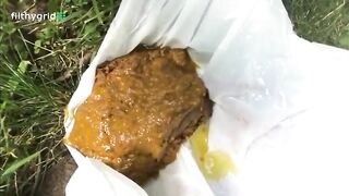 Girl in red dress takes a shit in white bag in the grass