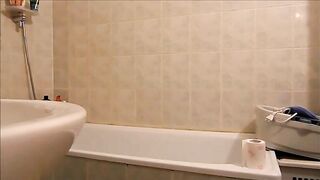 Blonde takes a sloppy shit in the bathtub