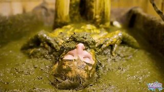 Girl lays in a pile of shit in a wooden room