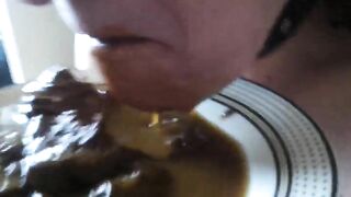 Girl in fetish collar eats a big plate of shit