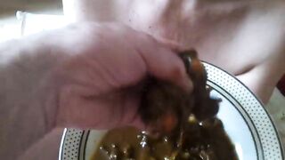 Girl in fetish collar eats a big plate of shit