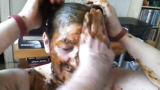 Woman smears her body with her own shit