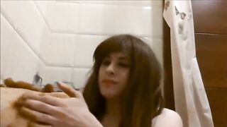 Babe squats and takes a huge shit in a bathtub