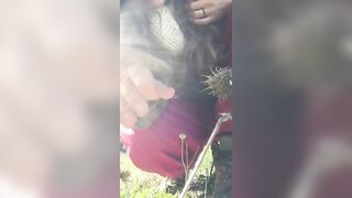 A hot woman shits in nature