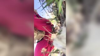 A hot woman shits in nature