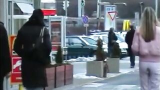 Girl pisses on the side of the road in front of traffic
