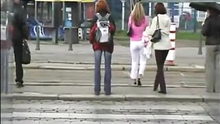 Woman sits on a toilet and takes a big shit in public